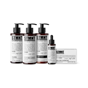 STMNT shampoo label and ingredient list close-up, highlights sulfate-free formulation