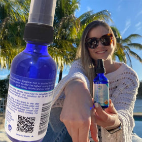 STREAM 2 SEA 2 fl oz bottle beside everyday items for scale