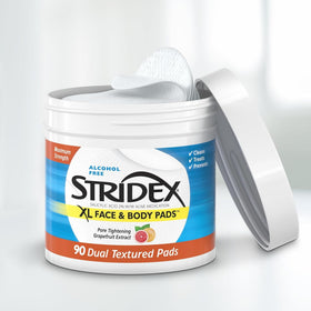 Stridex XL textured pad close-up illustrating exfoliating surface for deeper cleansing