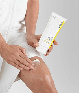 StriVectin being massaged into a leg to visibly firm skin