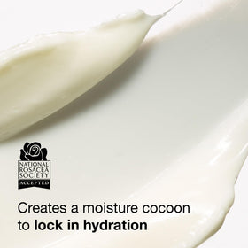 StriVectin cream on fingertip demonstrating easy spreadability and absorbency