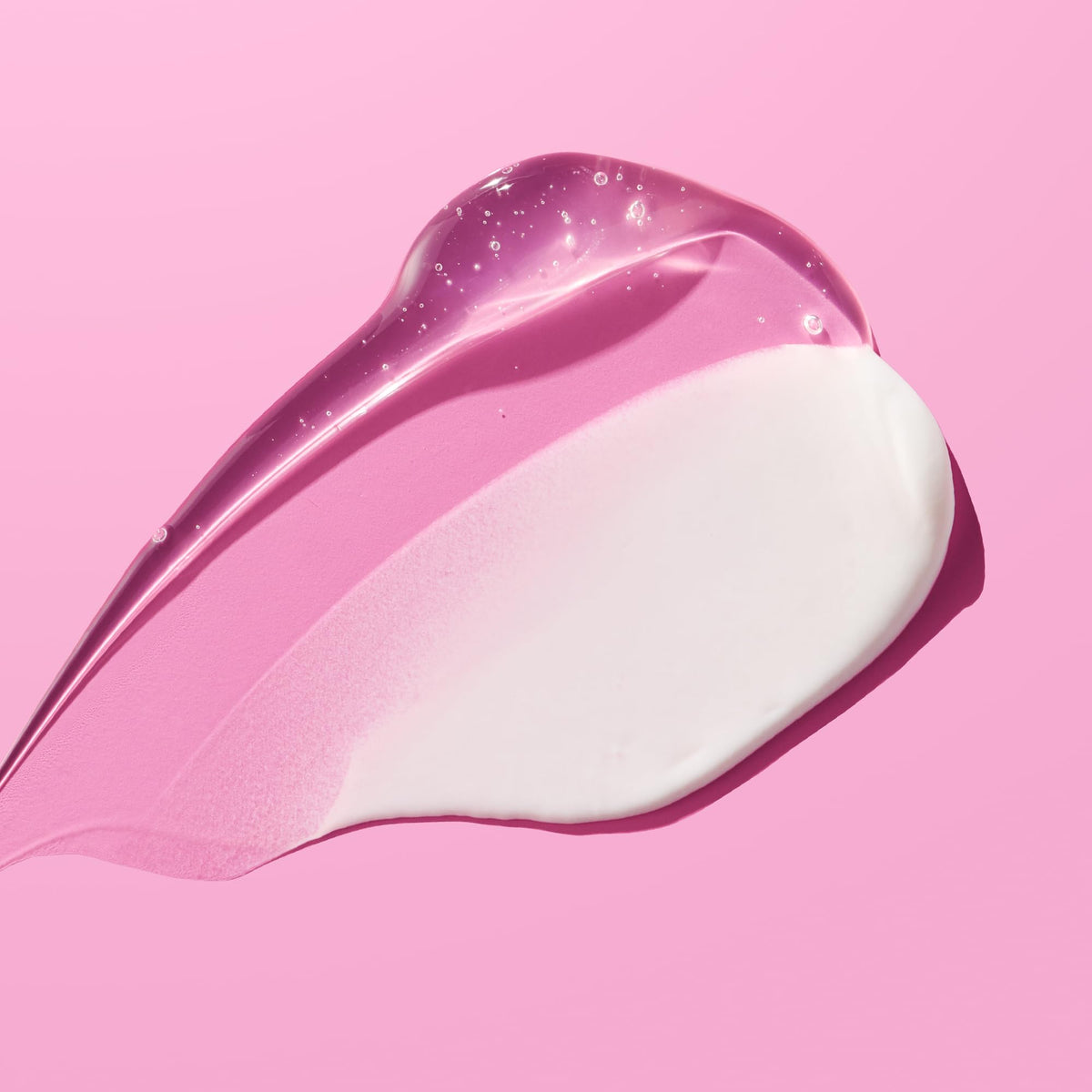 StriVectin lotion layer spread on skin showing emollient barrier-sealing benefit