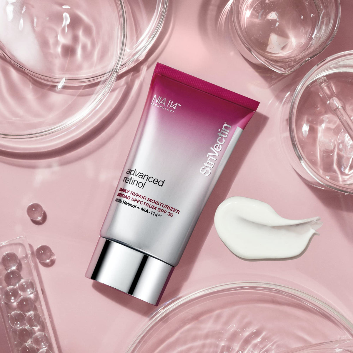 Person applying StriVectin during morning routine showing SPF protection benefit