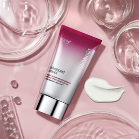 Person applying StriVectin during morning routine showing SPF protection benefit