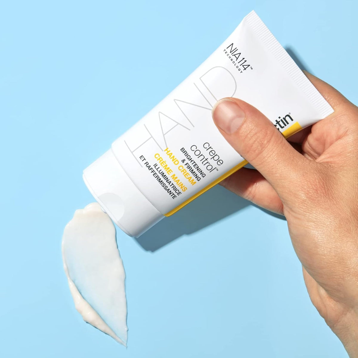 StriVectin cream texture close-up highlighting smooth, fast-absorbing formula benefit