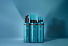 St.Tropez lifestyle image spraying back and shoulders for even coverage