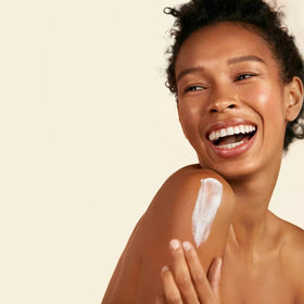 Suave lotion applied to hand illustrating quick absorption and smooth finish