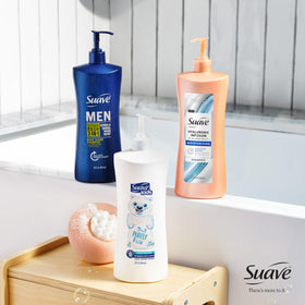 Suave hyaluronic bottle next to everyday items showing 28 oz scale