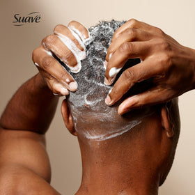 Man using Suave in the shower for quick head-to-toe cleansing