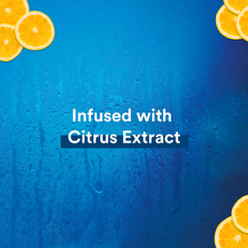 Suave Citrus Rush bottle in hand illustrating travel-size convenience and easy packing benefit