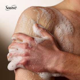Man using Suave in shower demonstrating easy head-to-toe cleansing benefit