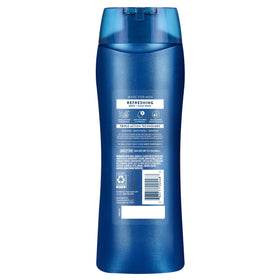 Hand holding 18 oz Suave bottle to show size and portable convenience benefit