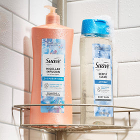 Suave bottles on bathroom shelf with family items showing family-friendly bulk pack and convenient pump benefit