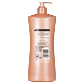 Suave 28 fl oz pump next to a common shampoo for scale showing value-sized family pack benefit