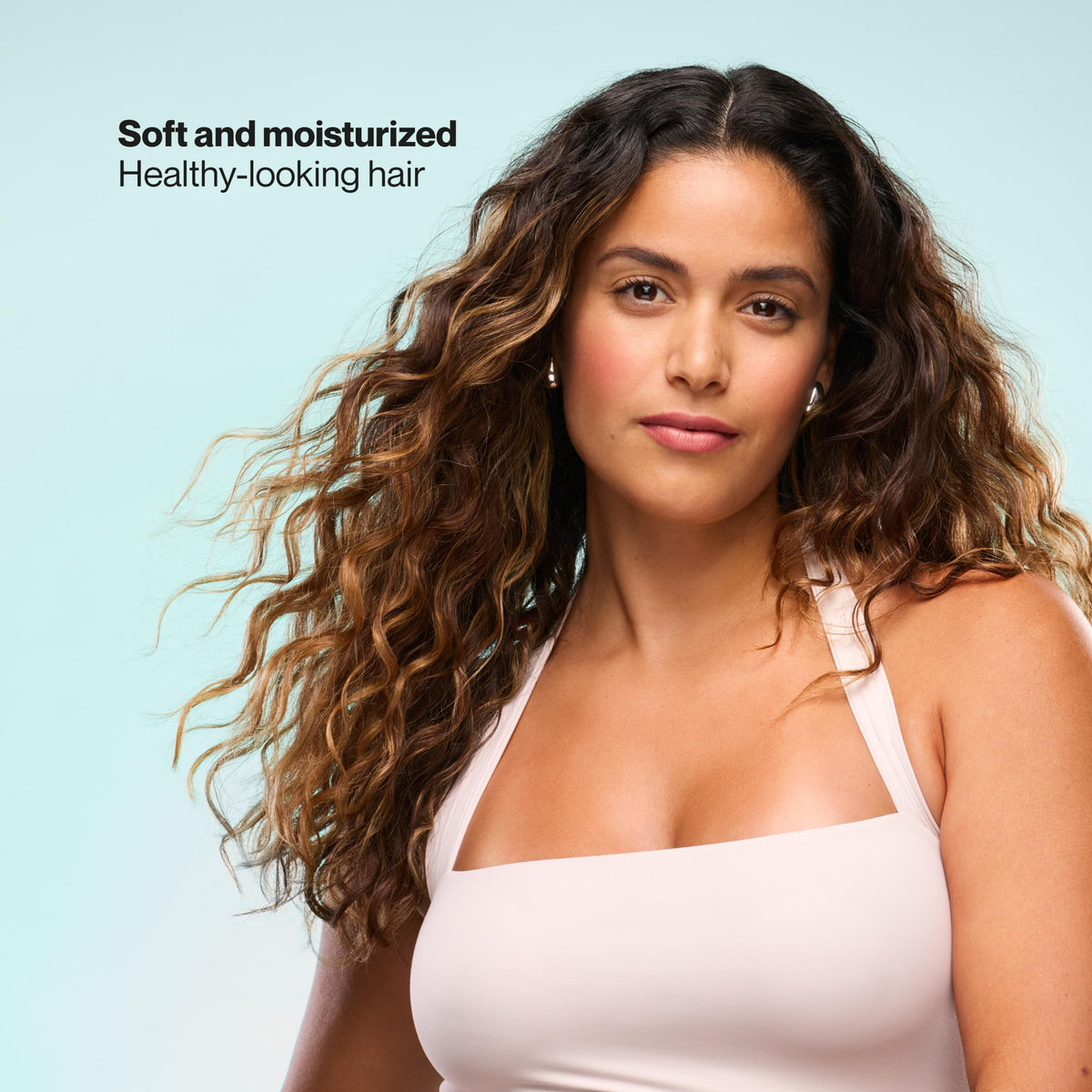 Close-up of Suave shampoo texture dispensed, demonstrating light hydration