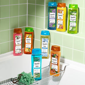 Suave body wash on a shower pouf in use showing effortless foaming benefit