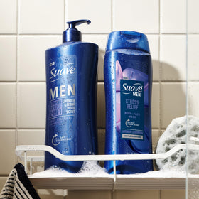 18 oz Suave bottle in hand to show size and portability benefit