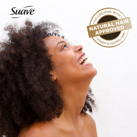 Suave 16.5 fl oz bottle beside everyday toiletries for scale