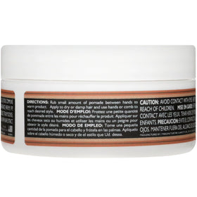Close-up of Suavecito ingredient label showing product details and usage guidance