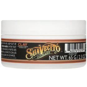 Suavecito Firme Clay in hand to show 2.3 oz size and travel-friendly convenience