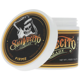 Close-up of Suavecito label emphasizing American-made quality and scent