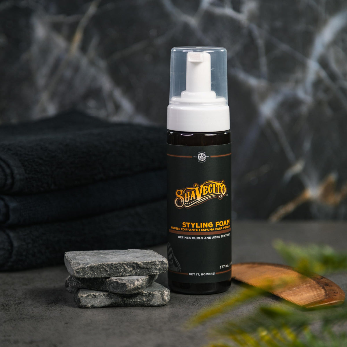 Suavecito foam texture on hand illustrating lightweight, nonsticky formula