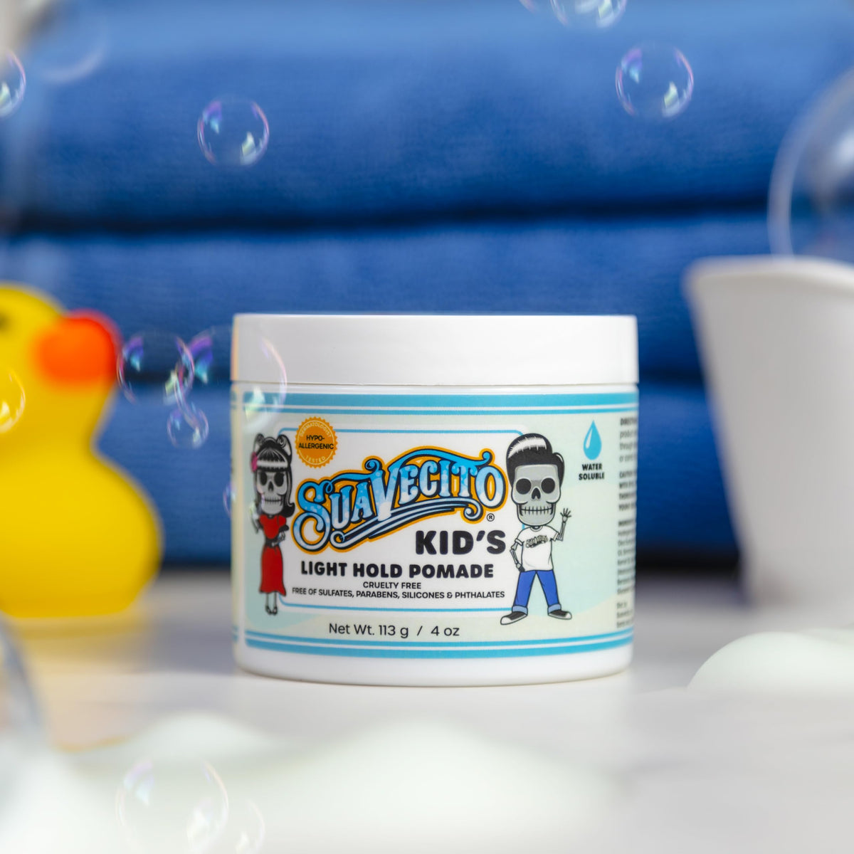 Suavecito jar on bathroom counter as part of kids’ routine showing calming scent benefit