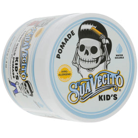 Suavecito 4 oz jar next to common items to show scale and travel-friendly size