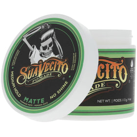 Suavecito matte pomade on a barber station portraying professional use benefit