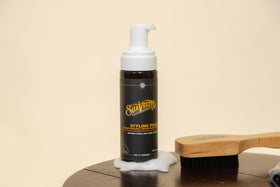 Suavecito size and scale held in hand indicating travel‑friendly convenience