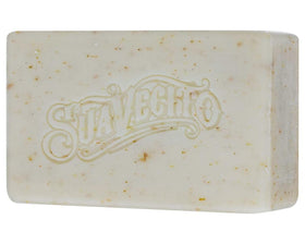 Suavecito bar in hand for scale showing 6 oz size and easy grip