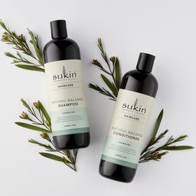Sukin shampoo pump and label close-up, showing signature scent and benefits