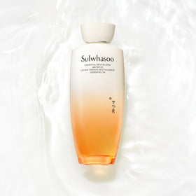 Sulwhasoo bottle with floral props conveying botanical formulation and calming effect