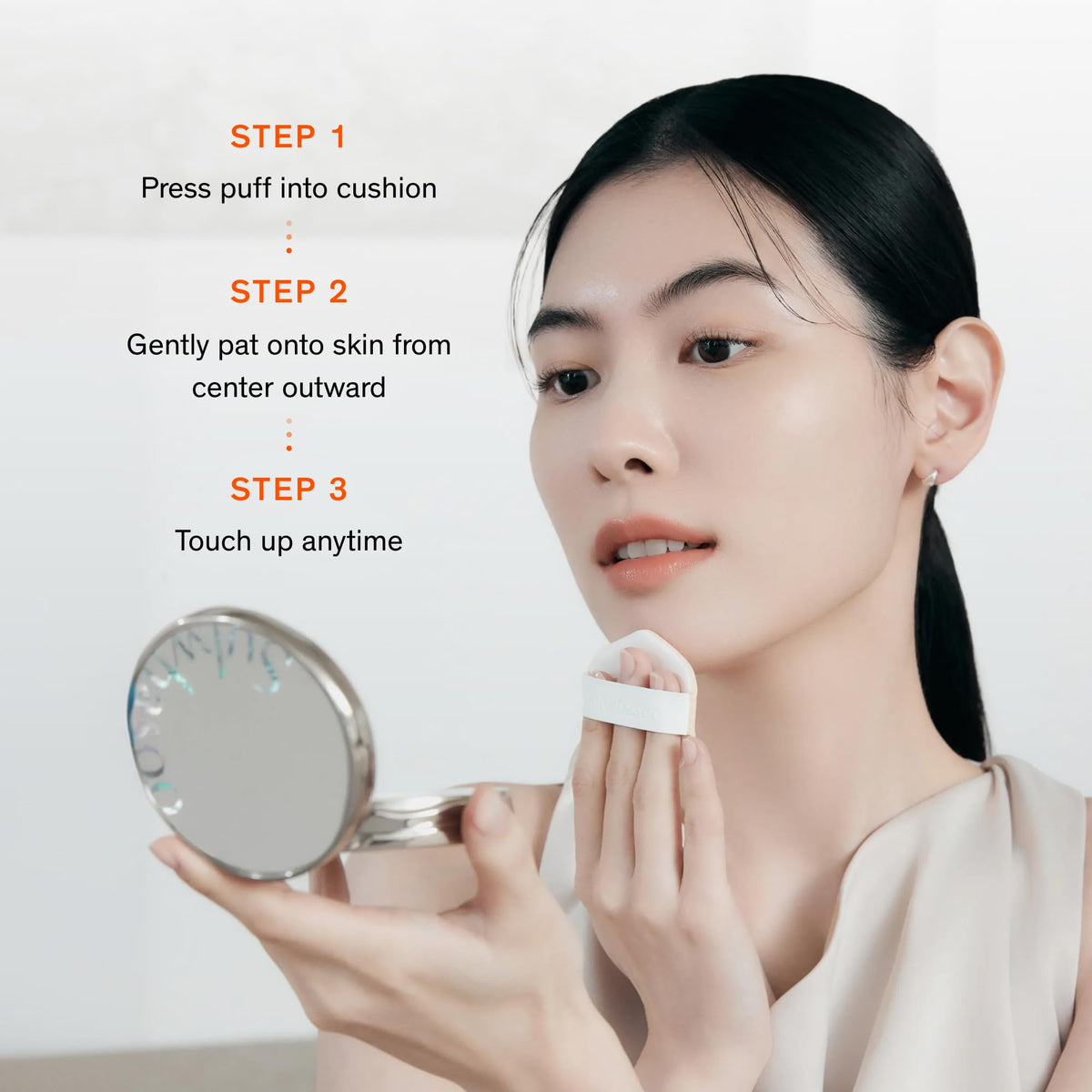 Sulwhasoo lifestyle image of woman applying cushion for quick touch-up benefit