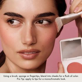 Summer Fridays on bathroom vanity in lifestyle scene, suggests everyday skincare-makeup ease