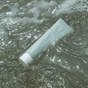 Summer Fridays bottle in hand for scale, communicates travel-friendly five ounce size