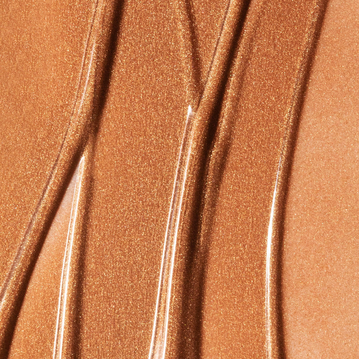 Summer Fridays applied to model cheek, showing natural sun-kissed radiance benefit