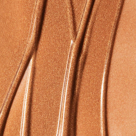 Summer Fridays applied to model cheek, showing natural sun-kissed radiance benefit