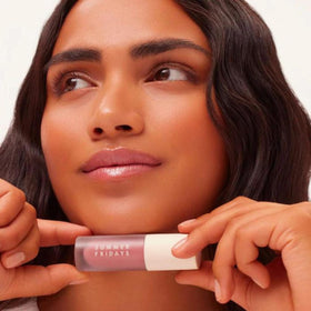 Summer Fridays texture swirl of lip oil displaying glossy, non-sticky sheen and rich hydration