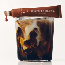Summer Fridays lifestyle on coffee table suggesting everyday use and aesthetic benefit