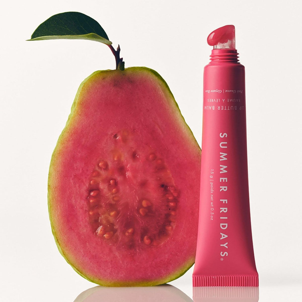 Summer Fridays on lips lifestyle shot showing glossy sheer color and fresh look
