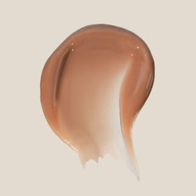 Summer Fridays open balm top view revealing creamy texture and instant shine benefit