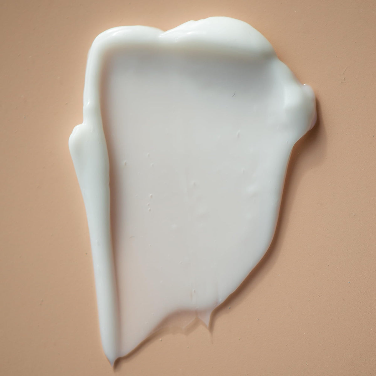 Summer Fridays cream texture closeup demonstrating smooth, fast-absorbing lotion benefit