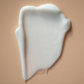 Summer Fridays cream texture closeup demonstrating smooth, fast-absorbing lotion benefit