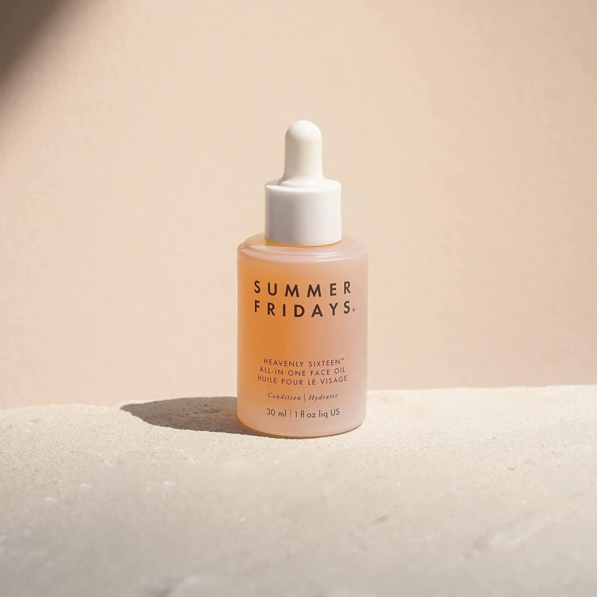 Summer Fridays dropper close-up dispensing a precise drop for easy application