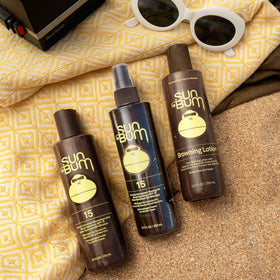 Sun Bum applied on arm demonstrating even coverage and tanning support
