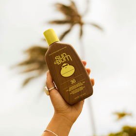Sun Bum sunscreen being applied on arm demonstrating easy absorption