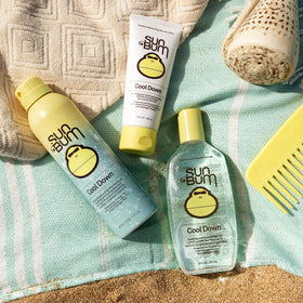 Sun Bum in-use on forearm at beach providing cooling relief and soothing moisture