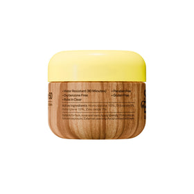 Sun Bum face cream used at beach showing water-resistant outdoor benefit