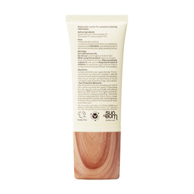 Sun Bum face SPF50 lifestyle shot at beach showing everyday sun protection benefit